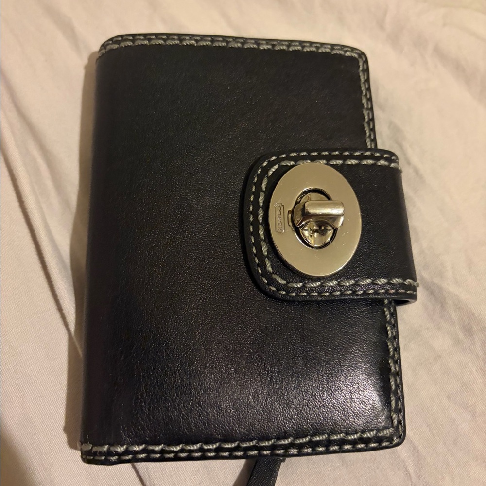 Trendy coach wallet/planner